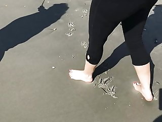 Sister in Law's feet in motion on the beach